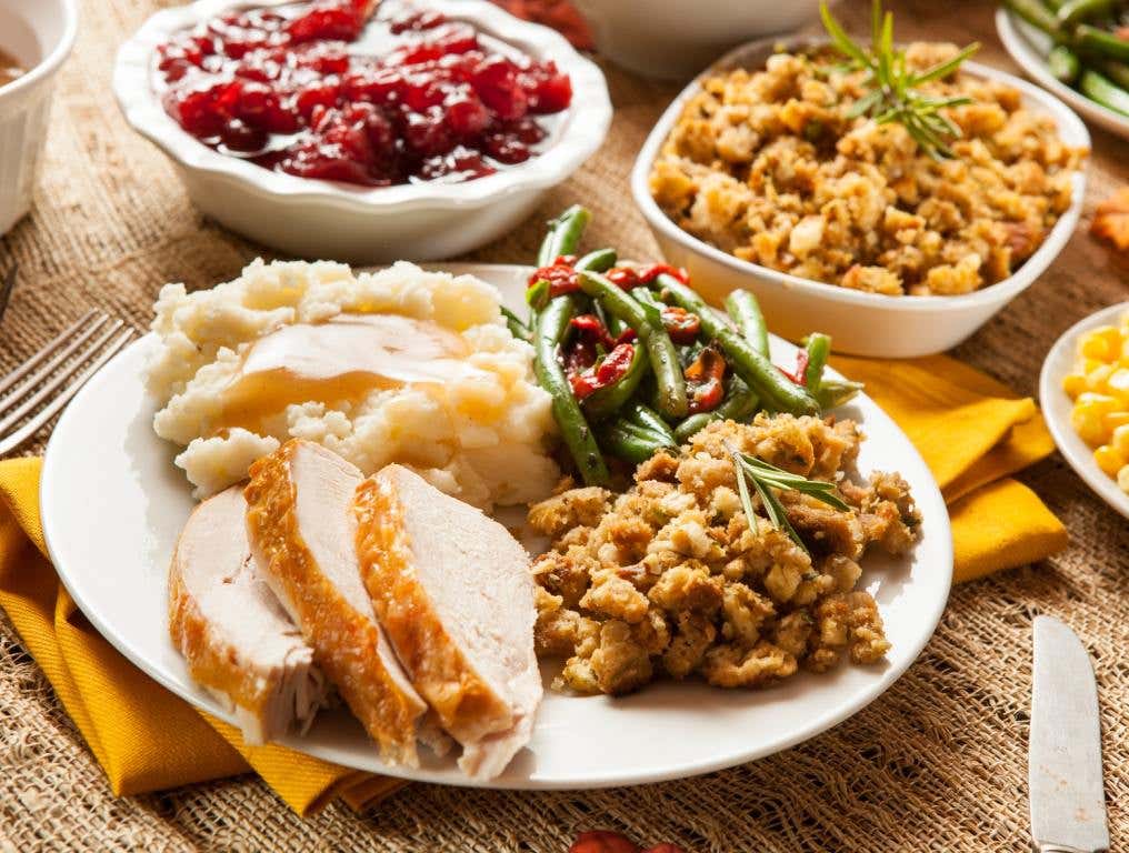 Homemade Turkey Thanksgiving Dinner with Mashed Potatoes, Stuffing, and Corn