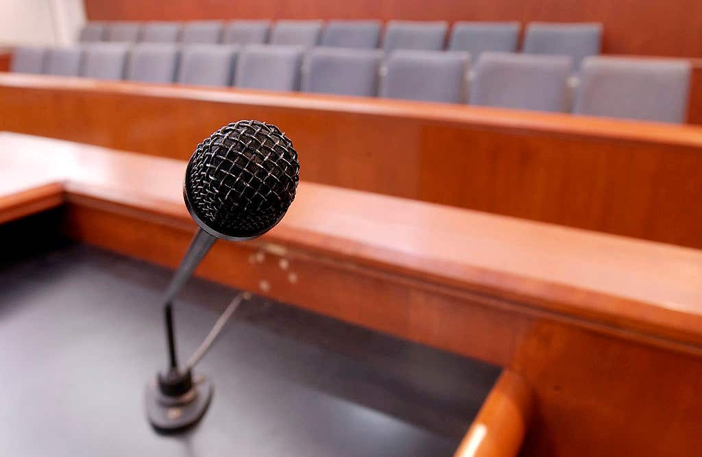 Mic on the stand in a courtroom. Jury Duty Scam Targeting Las Vegas Residents