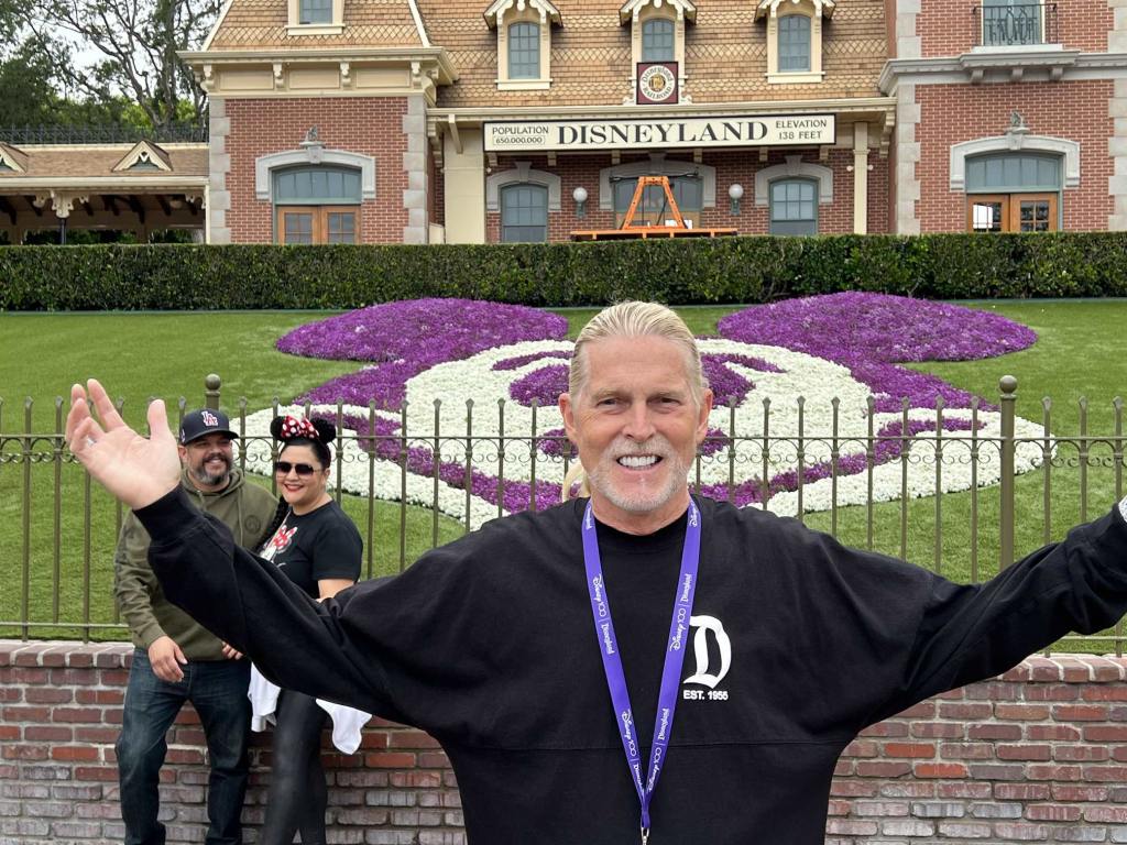 Shawn Stevens at the entrance to the Disneyland Park