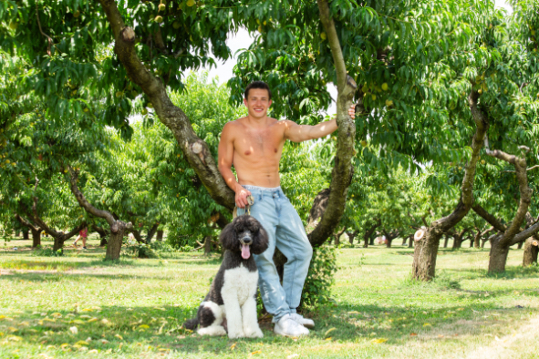 Andie Summers' dog Bob Ross poses with model Ethan for Philadoptables Hunks for Hounds calendar